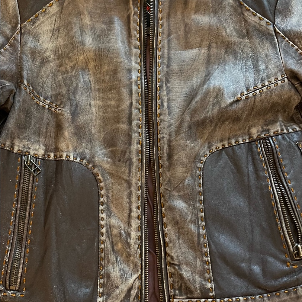 Distressed leather jacket
